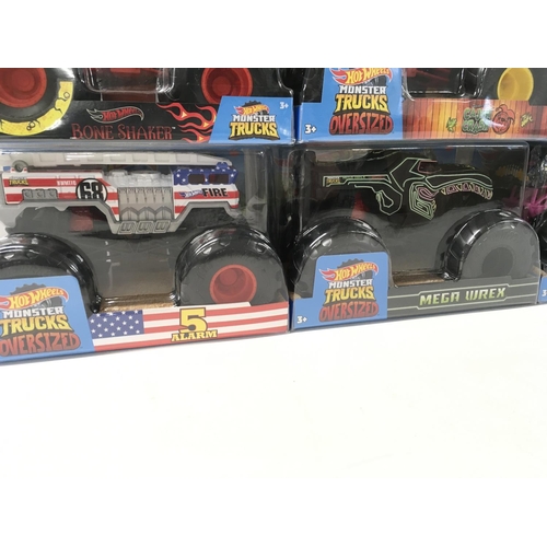 359 - A collection of 8 unopened Hot Wheels Monster Trucks 1:24 scale. Includes Cajun Crash..Bone Shaker p... 