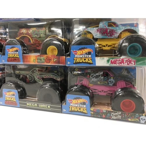 359 - A collection of 8 unopened Hot Wheels Monster Trucks 1:24 scale. Includes Cajun Crash..Bone Shaker p... 