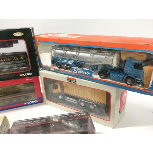 369 - An assorted collection of 10 boxed model vehicles commercial or trams etc. Manufacturers include Cor... 