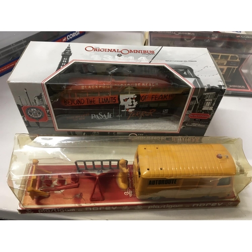 369 - An assorted collection of 10 boxed model vehicles commercial or trams etc. Manufacturers include Cor... 