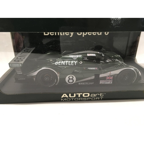 373 - 2x Autoart motorsport models includes boxed Bentley Speed 8 Le Mans 2003 with green livery.. Also un... 