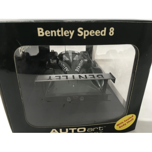 373 - 2x Autoart motorsport models includes boxed Bentley Speed 8 Le Mans 2003 with green livery.. Also un... 