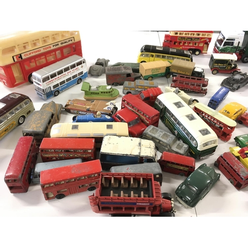 38 - A collection of in excess of 40 model diecast vehicles by various manufacturers including a group of... 