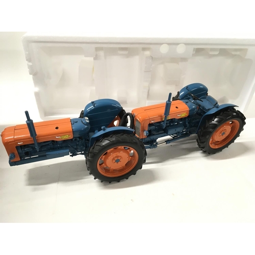 380 - A boxed Model tractor by Universal Hobbies featuring a Ford DOE Triple D. Scale 1:16 No reserve