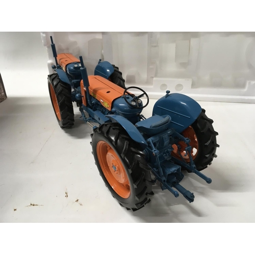 380 - A boxed Model tractor by Universal Hobbies featuring a Ford DOE Triple D. Scale 1:16 No reserve