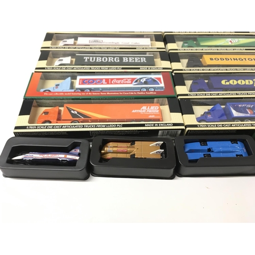 384 - A collection of 25 boxed model vehicles including truck and trailers..vans and cars. Manufacturers i... 