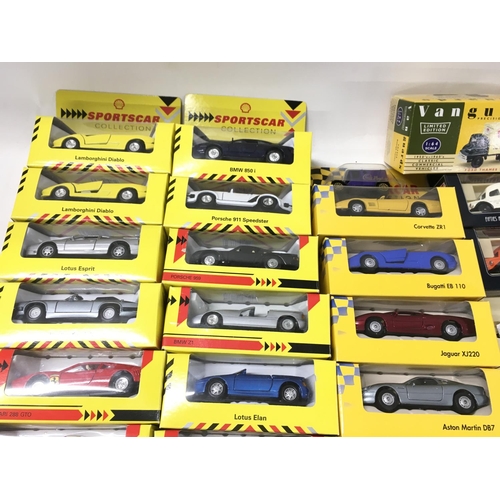 385 - A collection in excess of 40 boxed model vehicles includes Shell sports cars..days gone..vanguards. ... 