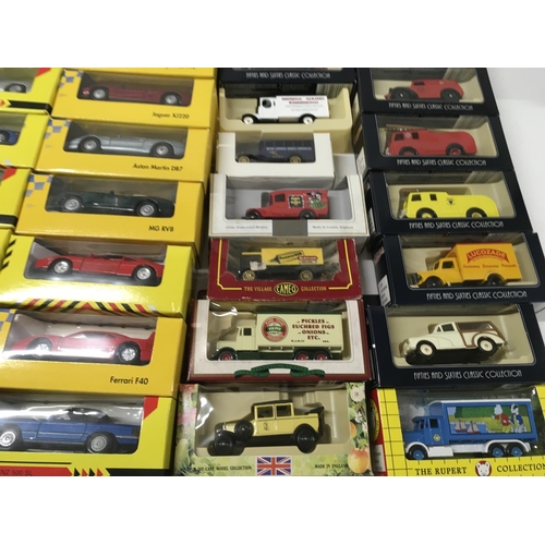 385 - A collection in excess of 40 boxed model vehicles includes Shell sports cars..days gone..vanguards. ... 