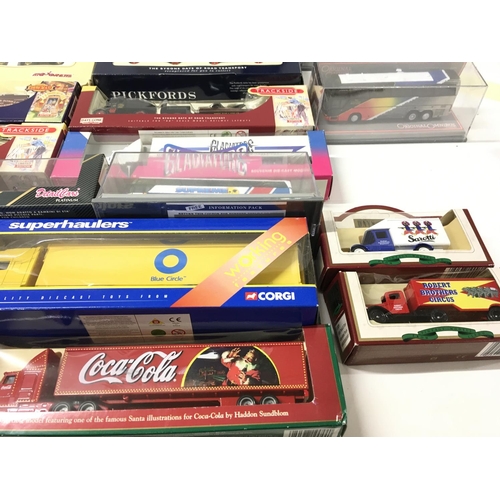 387 - An assorted collection of model diecast vehicles manufactured by Corgi..Lledo etc. mainly a commerci... 