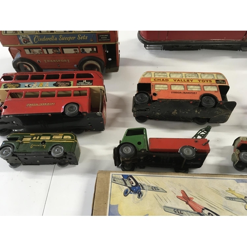 39 - A collection of mainly clockwork tin plate toys by various manufacturers including from Gescha DRGM.... 