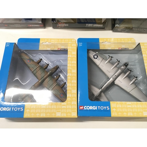 392 - A collection of 9 boxed WW11 themed diecast models by Corgi and Lledo. Includes planes..Tank. Etc.