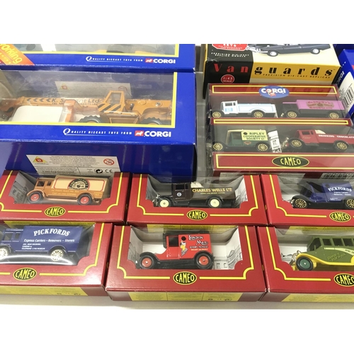 393 - A collection in excess of 25 boxed diecast vehicles manufactured by Corgi..Lledo..Maisto etc. includ... 