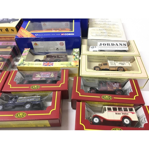 393 - A collection in excess of 25 boxed diecast vehicles manufactured by Corgi..Lledo..Maisto etc. includ... 