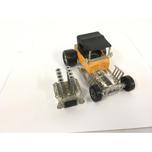 4 - A Matchbox Superkings pre production model T hotrod in orange livery a black roof and no decals.