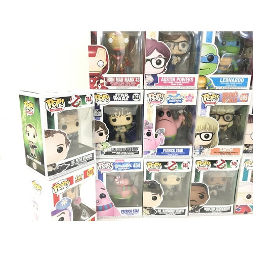 42 - A collection of 17 boxed Funko Pop figures.