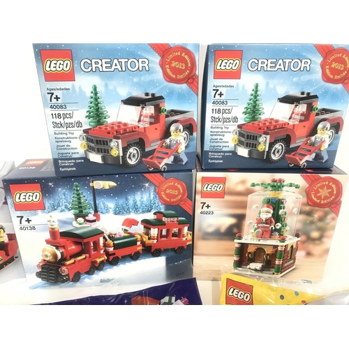 431 - A Collection of Boxed And Sealed Lego Christmas Sets. 2 X Christmas Tree Truck. #40083. A Snow Globe... 