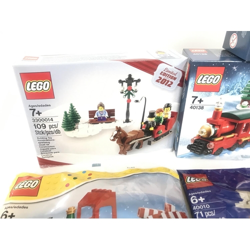 431 - A Collection of Boxed And Sealed Lego Christmas Sets. 2 X Christmas Tree Truck. #40083. A Snow Globe... 