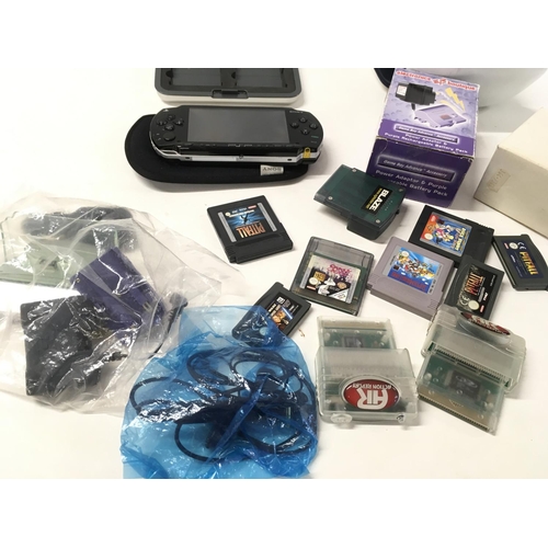 47 - A Gameboy advance and PSP plus games and accessories.