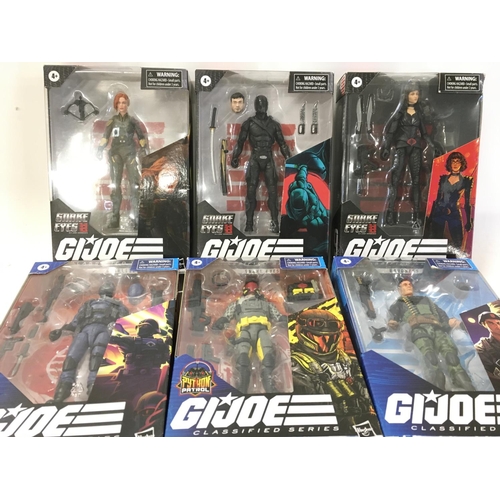 48 - A collection of 8 boxed GI Joe classified action figures.