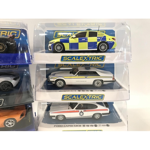 500 - 6 X Boxed Scalextric Cars. A Lotus Evora. A McLaren 720S. A Lamborghini Aventador LP 700-4. A BMW 33... 