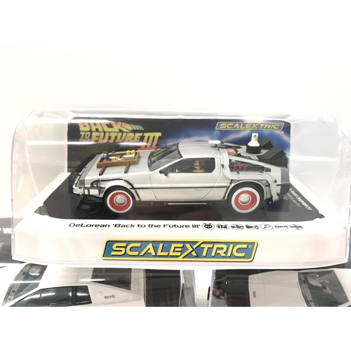 504 - 2 X Boxed Scalextric Lotus Esprits 007 and a Back To The Future III Delorean.