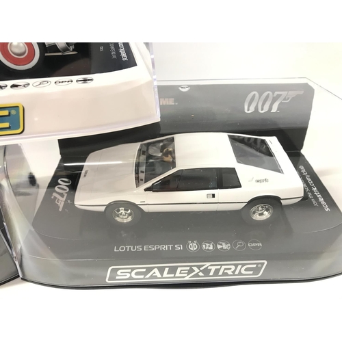 504 - 2 X Boxed Scalextric Lotus Esprits 007 and a Back To The Future III Delorean.