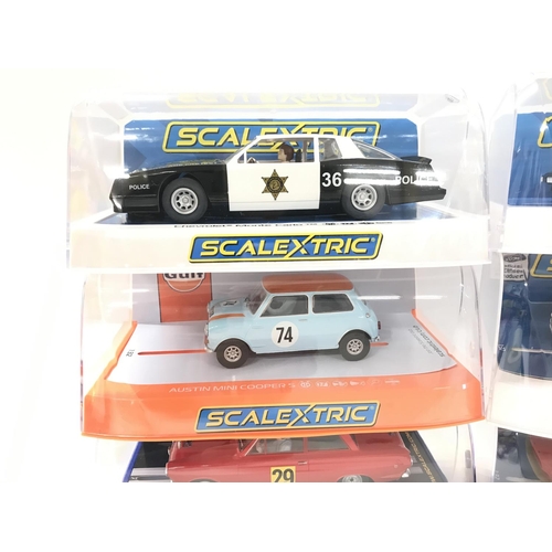 505 - 6 X Boxed Scalextric Cars. A Chevrolet Monte Carlo. A Austin Mini. A Ford Cortina GT. A Lotus Esprit... 