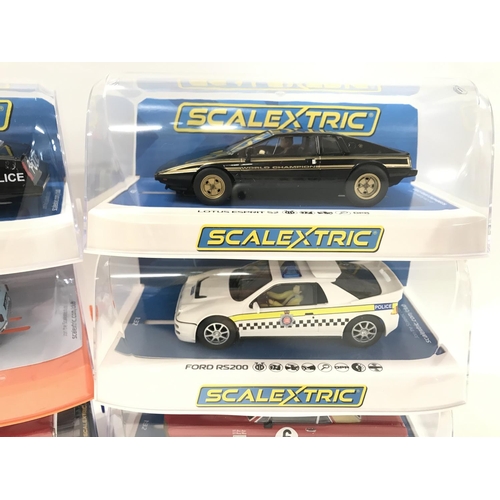 505 - 6 X Boxed Scalextric Cars. A Chevrolet Monte Carlo. A Austin Mini. A Ford Cortina GT. A Lotus Esprit... 