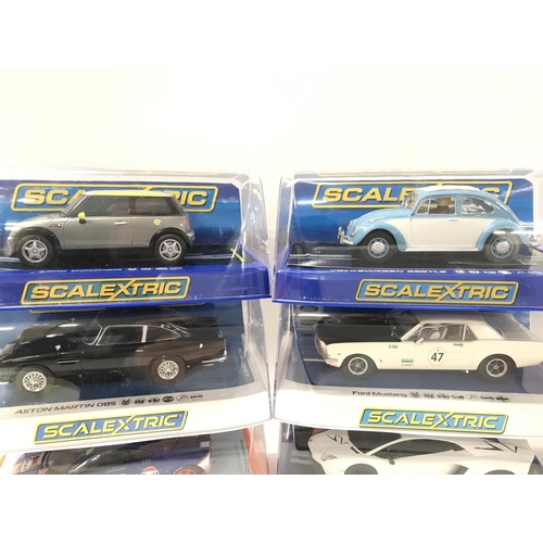 508 - 6 Boxed Scalextric Cars. A Mini Cooper. A Volkswagen Beetle. A Aston Martin DB5. A Ford Mustang. A M... 