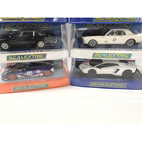 508 - 6 Boxed Scalextric Cars. A Mini Cooper. A Volkswagen Beetle. A Aston Martin DB5. A Ford Mustang. A M... 