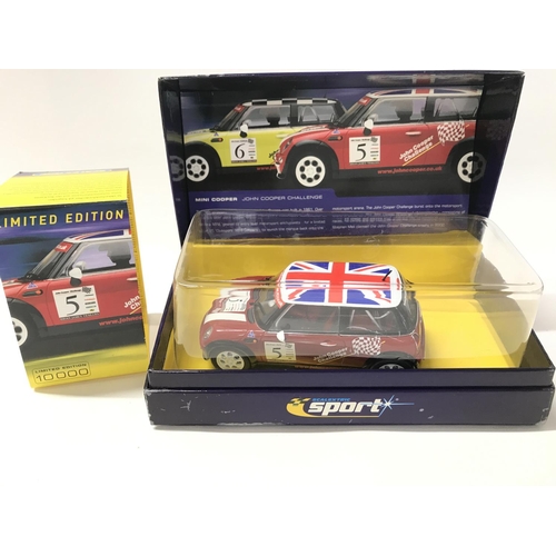 510 - 3 Boxed Scalextric Mini Coopers.