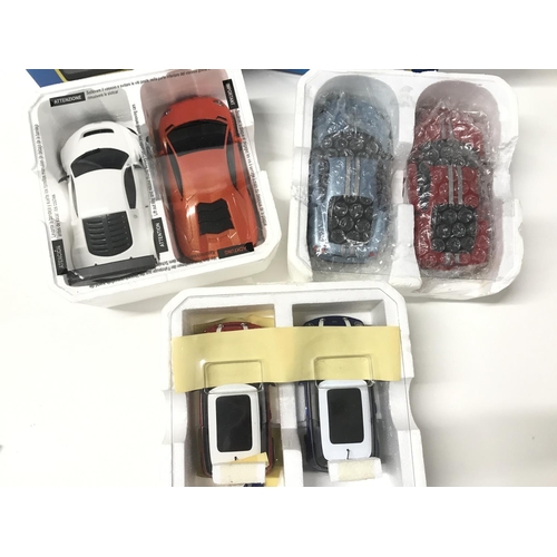 514 - 2 X Scalextric Racing Packs. A Boxed Audi R8 LMS. A GT Lightning and other Cars.