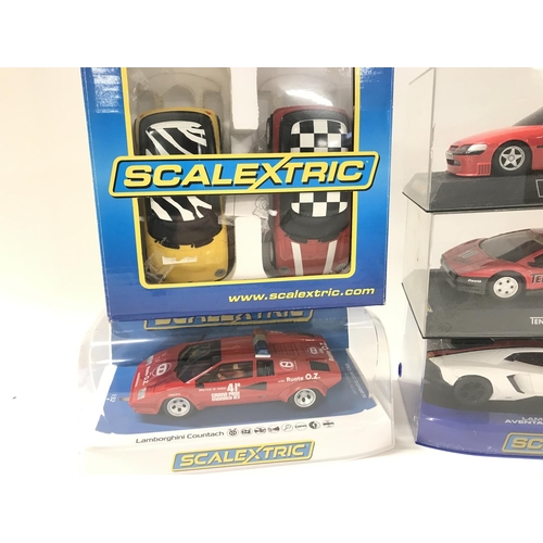 516 - 4 Boxed Scalextric cars and a Racing Pack. A Lamborghini Countach. A Lamborghini Aventador LP 700-4.... 