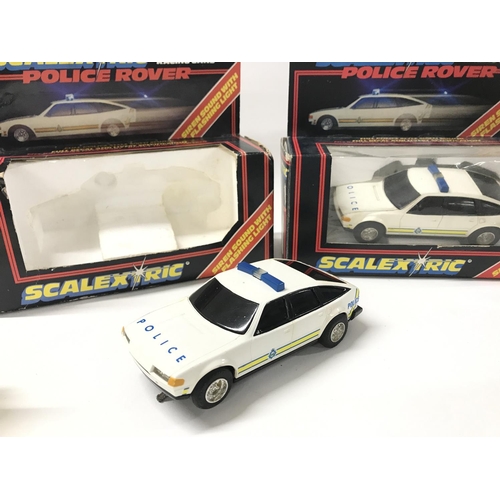 517 - 2 Boxed Scalextric Rover Police Cars #C.284.