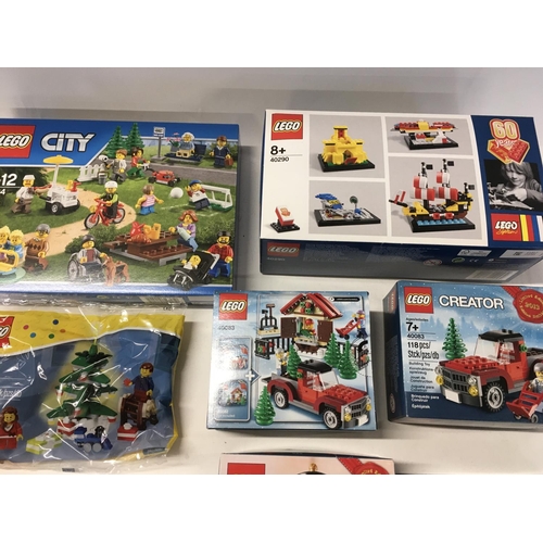 559 - A collection of 8 assorted unopened Lego sets including # 6119.. # 40254..# 40106.. # 40083.. # 4008... 