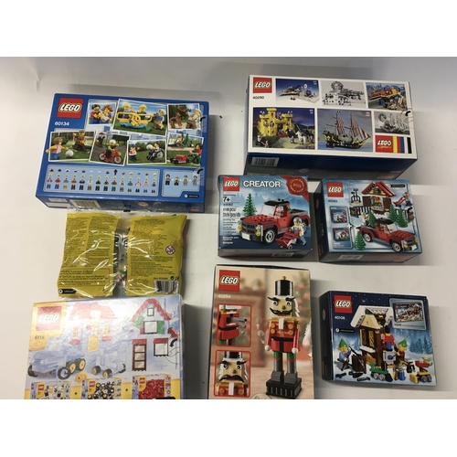 559 - A collection of 8 assorted unopened Lego sets including # 6119.. # 40254..# 40106.. # 40083.. # 4008... 