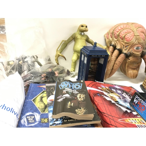 598 - A collection of Doctor Who items including action figuresâ¦mask..books..dvds etc. no reserve