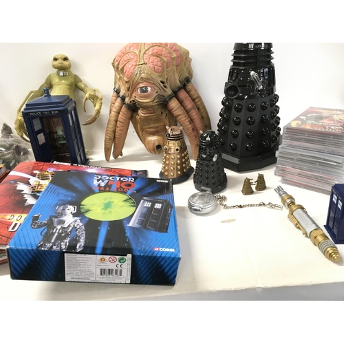 598 - A collection of Doctor Who items including action figuresâ¦mask..books..dvds etc. no reserve