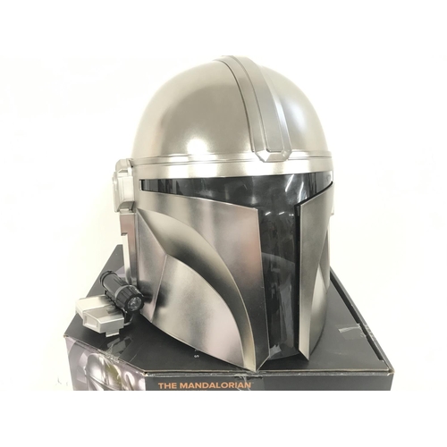 604 - A Boxed The Black Series Star Wars The Mandalorian Helmet.