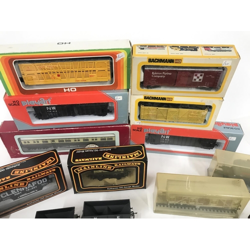 636 - A Collection of Boxed And Loose 00 and H0 Gauge Wagons and Coaches.Etc.