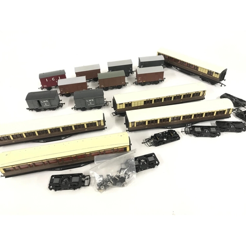 636 - A Collection of Boxed And Loose 00 and H0 Gauge Wagons and Coaches.Etc.