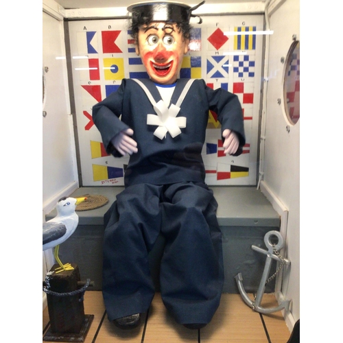 696 - A Scratch Built Coin Operated Laughing Sailor approximate Height 180Cm and width 54Cm. Can Be Seen W... 