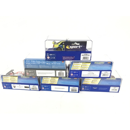 699 - 6 boxed Scalextric cars. To include Maserati Trofeo. Audi R8. Aston Martin DBS. Jaguar D-type. McLar... 