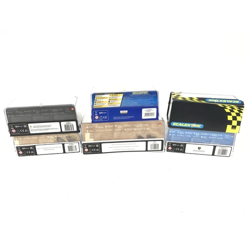 702 - 6 boxed Scalextric cars to include Mr Bean Mini. Mr Bean Reliant Supervan.Nissan GTR. Lotus Esprit. ... 