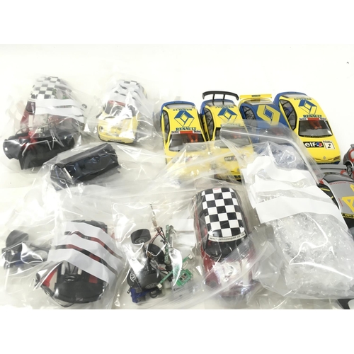 703 - A collection of Scalextric cars ..spare parts and accessories. No reserve