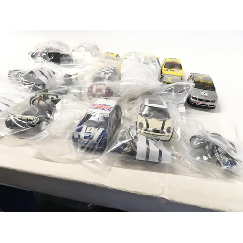 703 - A collection of Scalextric cars ..spare parts and accessories. No reserve