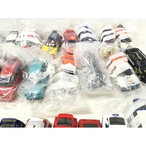 708 - A collection of Scalextric cars spares and accessories. No reserve