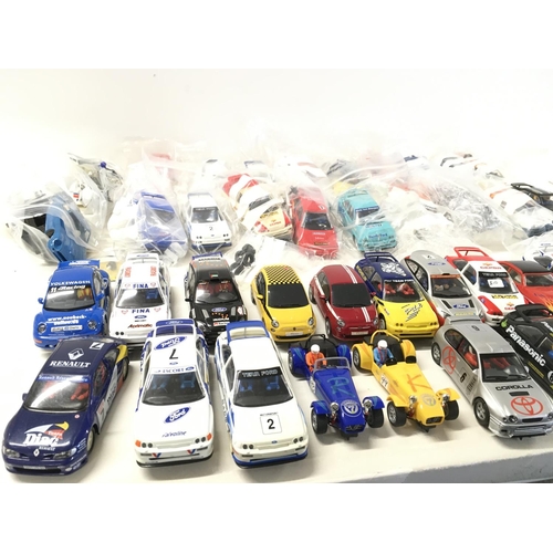 708 - A collection of Scalextric cars spares and accessories. No reserve