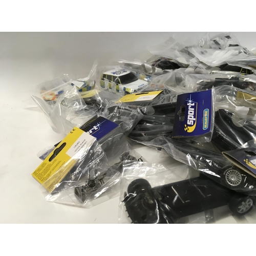 710 - A collection of Scalextric Cars spare parts and accessories. No reserve