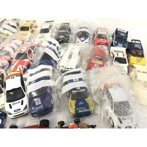 719 - A collection of approximately 30 Scalextric cars. Plus some accessories and spares. No reserve.